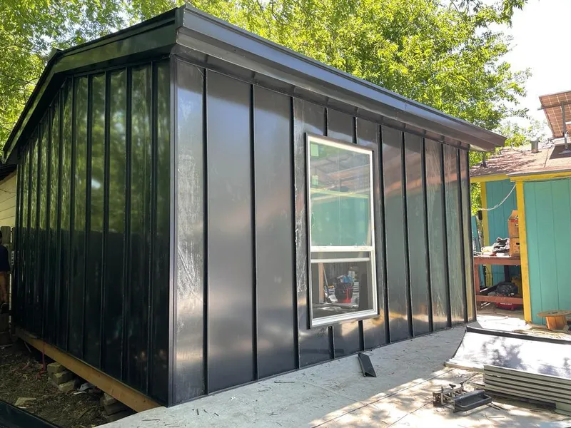 Black standing seam metal wall panels for Metal Roof Installation in Miramar Beach