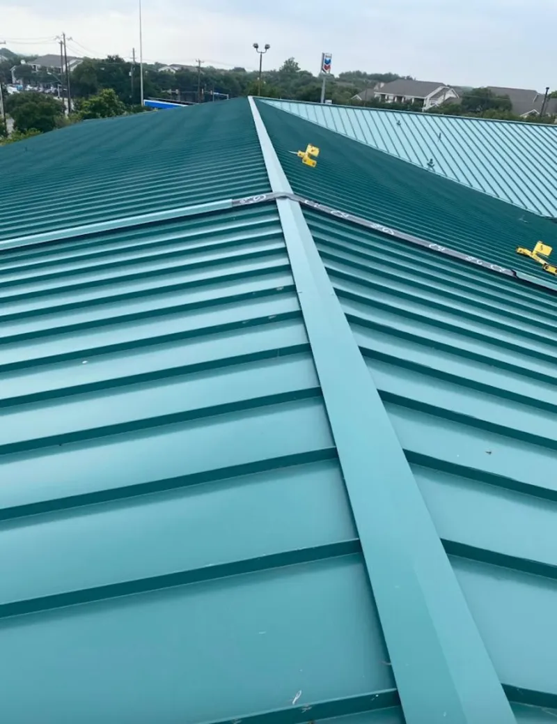 Green commercial metal roof ridge and valley for Metal Roof Repair in Miramar Beach